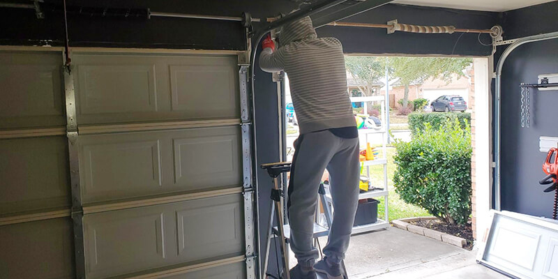 Understanding Common Causes of a Jammed Garage Door - CLT Garage Door Repair